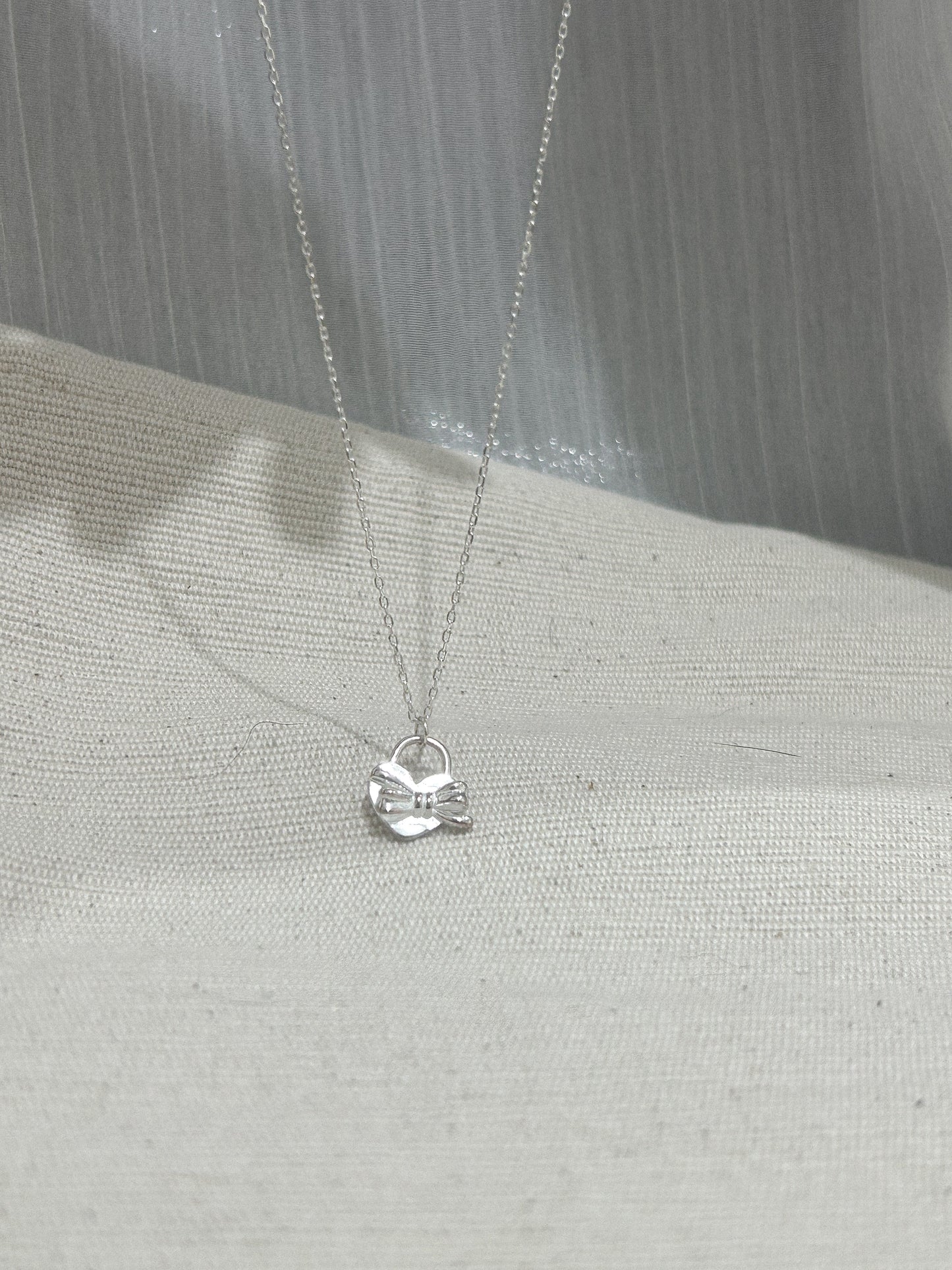 Ribbon Chram Lock Necklace